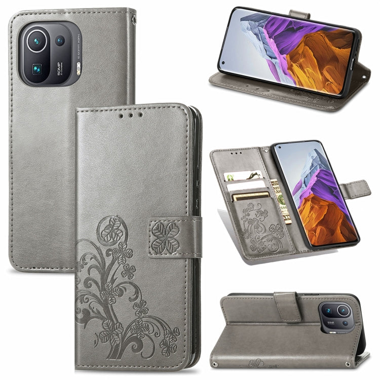 Four-leaf Clasp Embossed Buckle Mobile Phone Protection Leather Case with Lanyard & Card Slot & Wallet & Bracket Function, For OPPO Realme Q3 5G / Realme Q3i 5G, For OPPO Realme Q3 5G, For Xiaomi Mi 11 Pro, For Xiaomi Mi 11 Ultra, For ZTE A7S 2020